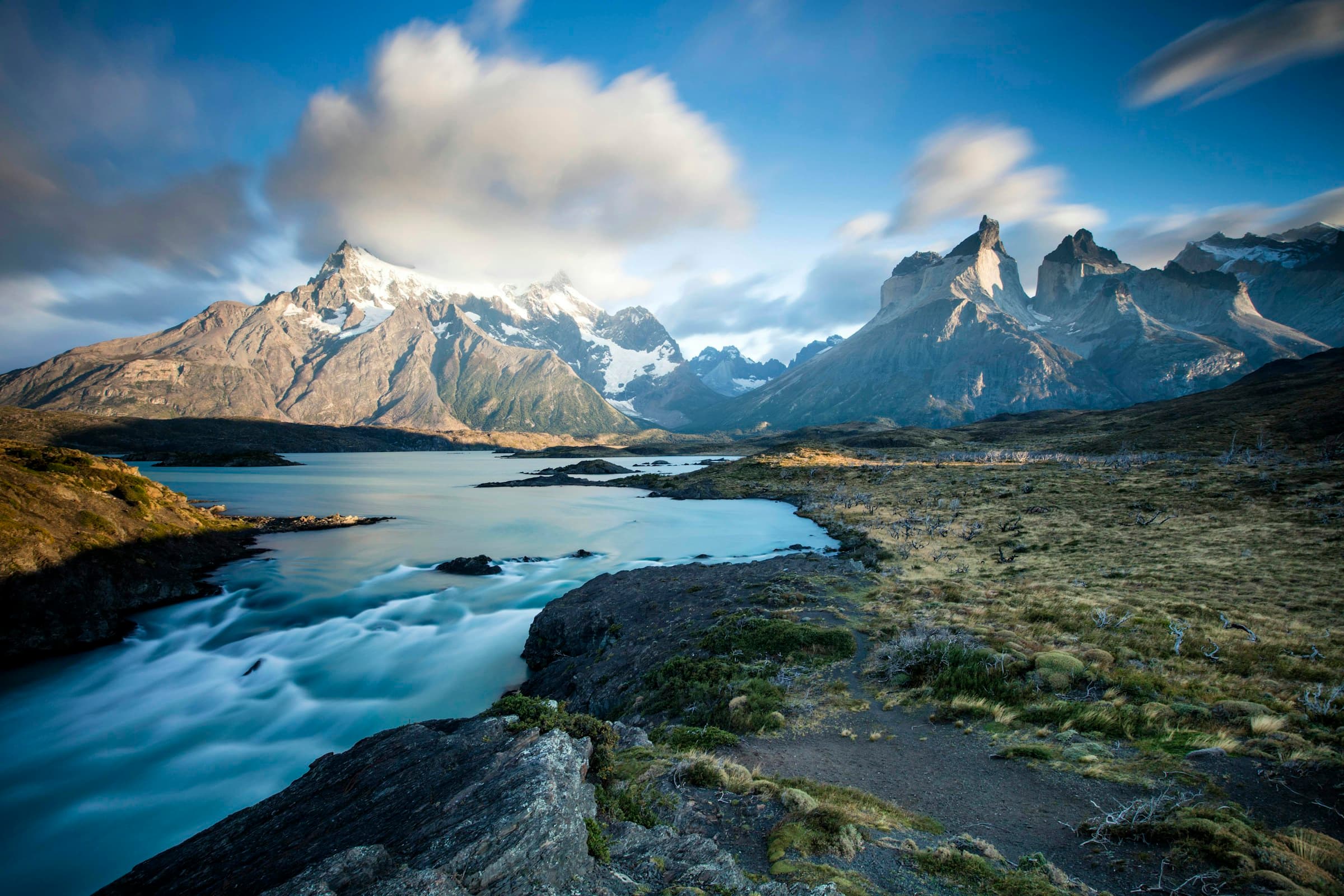 Torres del Paine mountains and glacial river in Chilean Patagonia